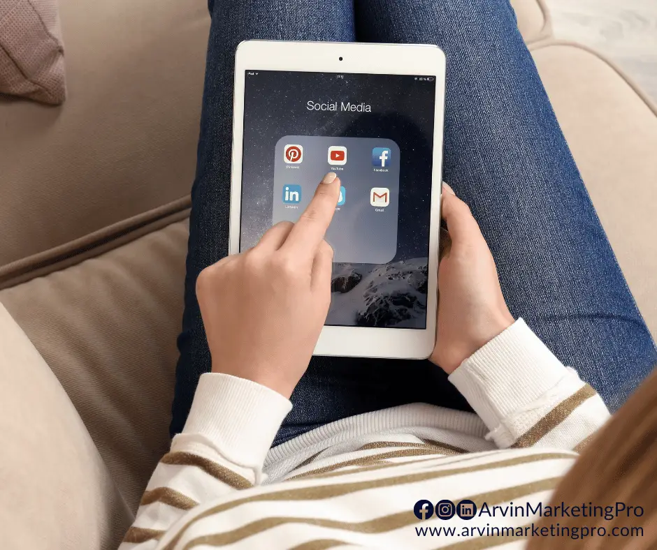 hand-clicking-a-social-media-app-with-paid-ads-on-a-tablet