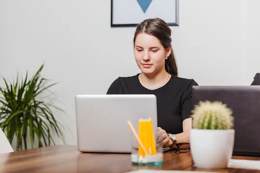 social-media-virtual-assistant-using-a-laptop